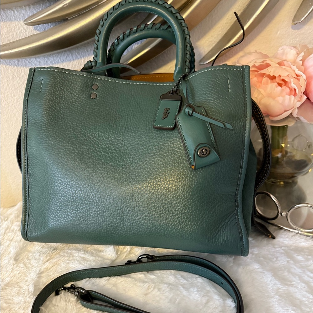 Coach Rogue 30 with whipstitch handle in dark turquoise.
